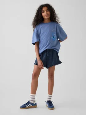 Pantaloncini corti in denim di garza di cotone per bambini con volant