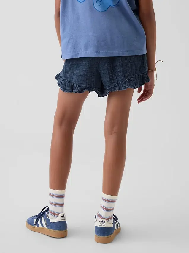 Pantaloncini corti in denim di garza di cotone per bambini con volant