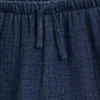 Pantaloncini corti in denim di garza di cotone per bambini con volant