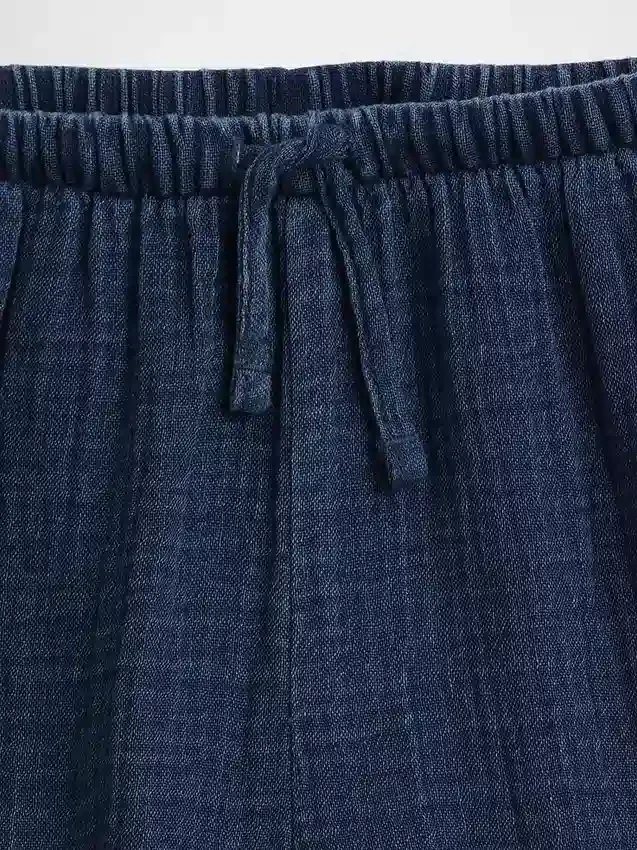 Pantaloncini corti in denim di garza di cotone per bambini con volant