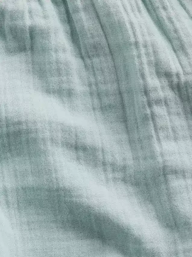 Pantaloncini da bambino in garza di cotone con orlo a farfalla