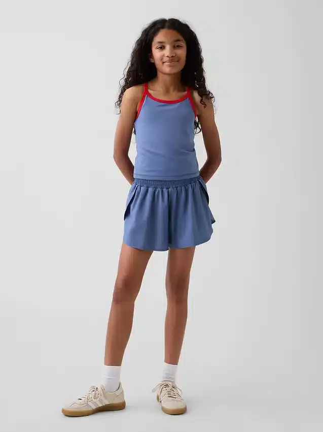 Pantaloncini da corsa a secco rapido con orlo a farfalla per bambini
