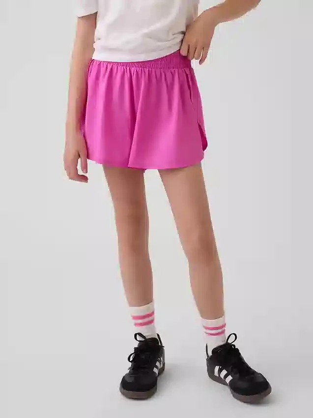 Pantaloncini da corsa a secco rapido con orlo a farfalla per bambini