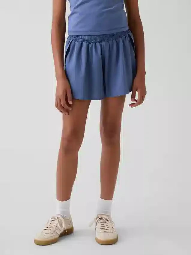 Pantaloncini da corsa a secco rapido con orlo a farfalla per bambini