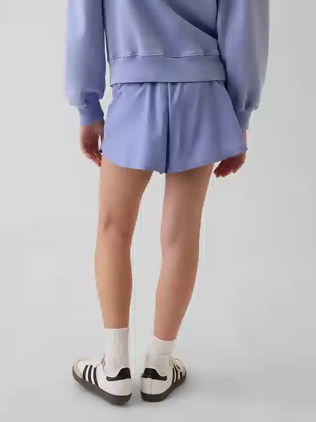 Pantaloncini da corsa a secco rapido con orlo a farfalla per bambini