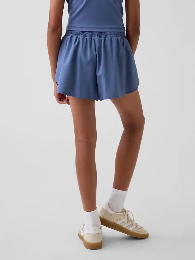 Pantaloncini da corsa a secco rapido con orlo a farfalla per bambini