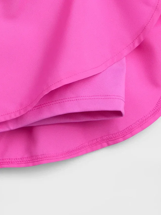 Pantaloncini da corsa a secco rapido con orlo a farfalla per bambini