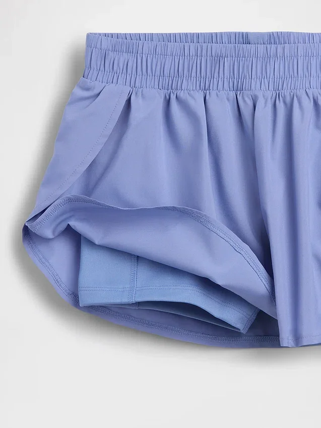 Pantaloncini da corsa a secco rapido con orlo a farfalla per bambini