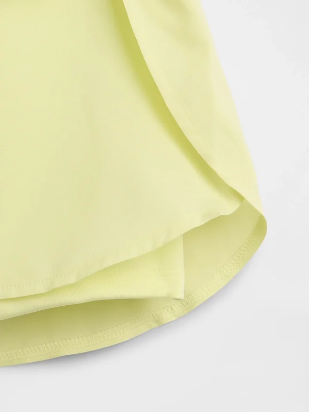 Pantaloncini da corsa a secco rapido con orlo a farfalla per bambini