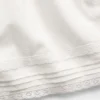Pantaloncini facili da indossare in misto lino e cotone con bordi in pizzo per bambini