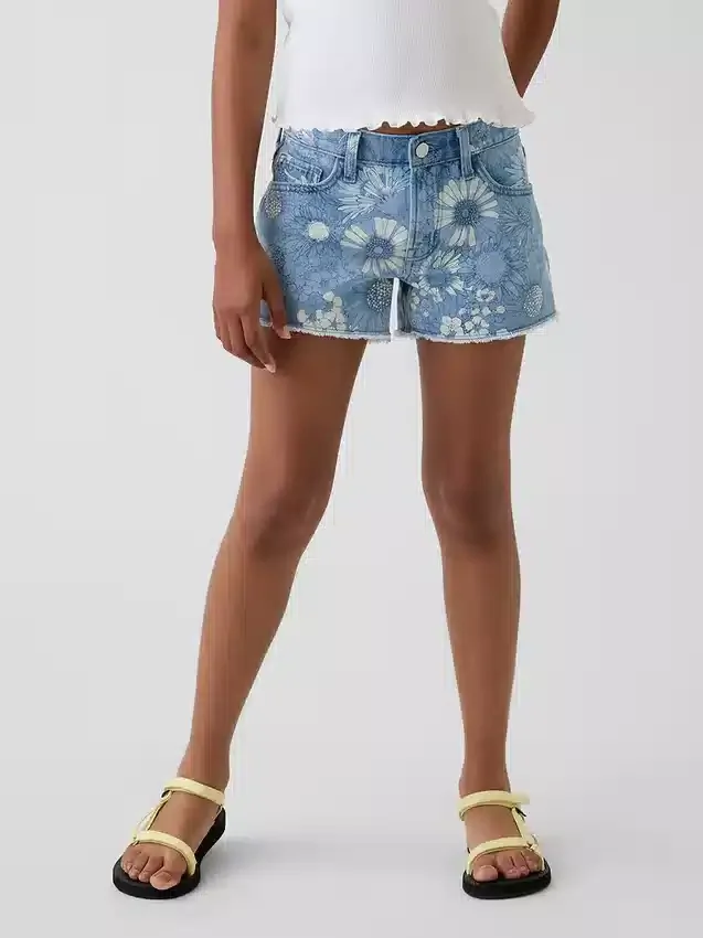 Pantaloncini in denim a vita bassa con motivo floreale per bambini