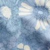 Pantaloncini in denim a vita bassa con motivo floreale per bambini
