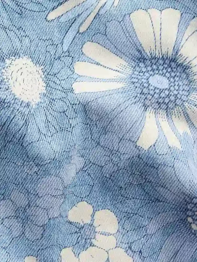 Pantaloncini in denim a vita bassa con motivo floreale per bambini
