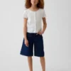 Pantaloncini in denim a vita bassa e linea allungata per bambini