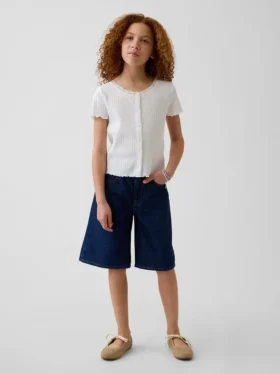 Pantaloncini in denim a vita bassa e linea allungata per bambini