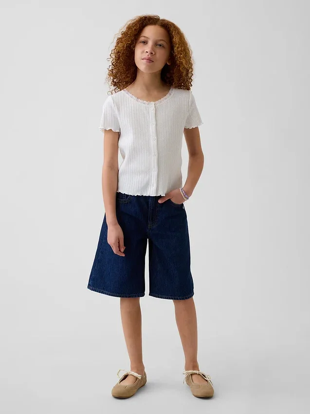 Pantaloncini in denim a vita bassa e linea allungata per bambini