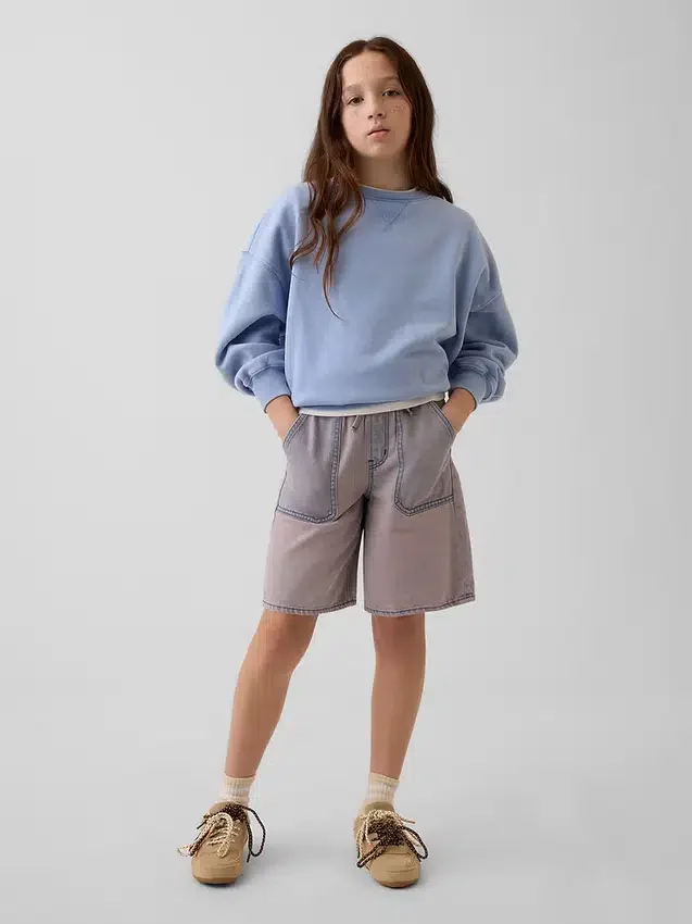 Pantaloncini in denim a vita bassa e linea allungata per bambini