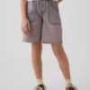 Pantaloncini in denim a vita bassa e linea allungata per bambini