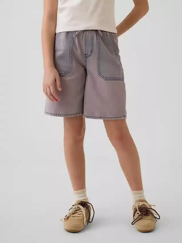 Pantaloncini in denim a vita bassa e linea allungata per bambini