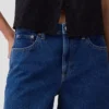 Pantaloncini in denim a vita media e linea lunga