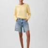Pantaloncini in denim dal taglio ampio a vita media da 8"