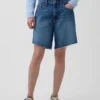 Pantaloncini in denim dal taglio ampio a vita media da 8"