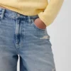 Pantaloncini in denim dal taglio ampio a vita media da 8"