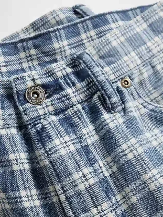 Pantaloncini larghi in denim a quadri stile anni ’90