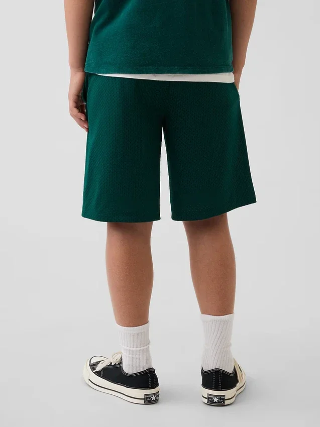 Pantaloncini sportivi in rete da bambino da 8"