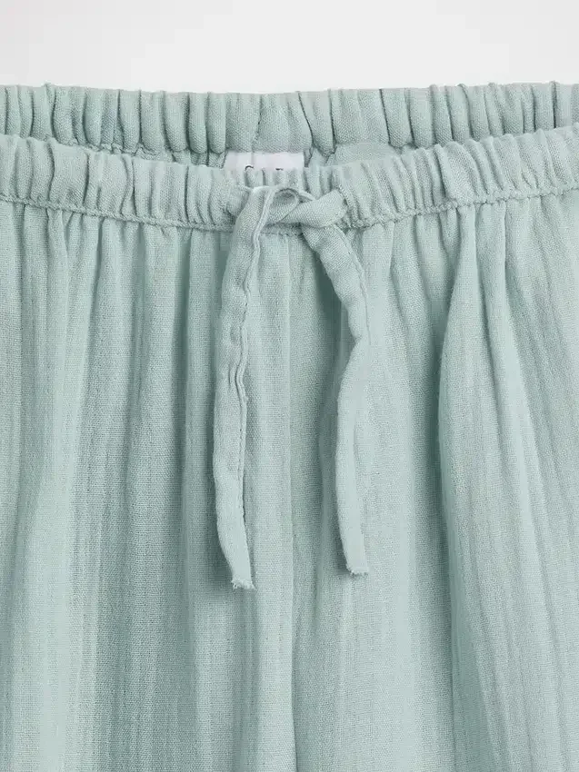 Pantaloni a gamba larga in garza di cotone per bambini