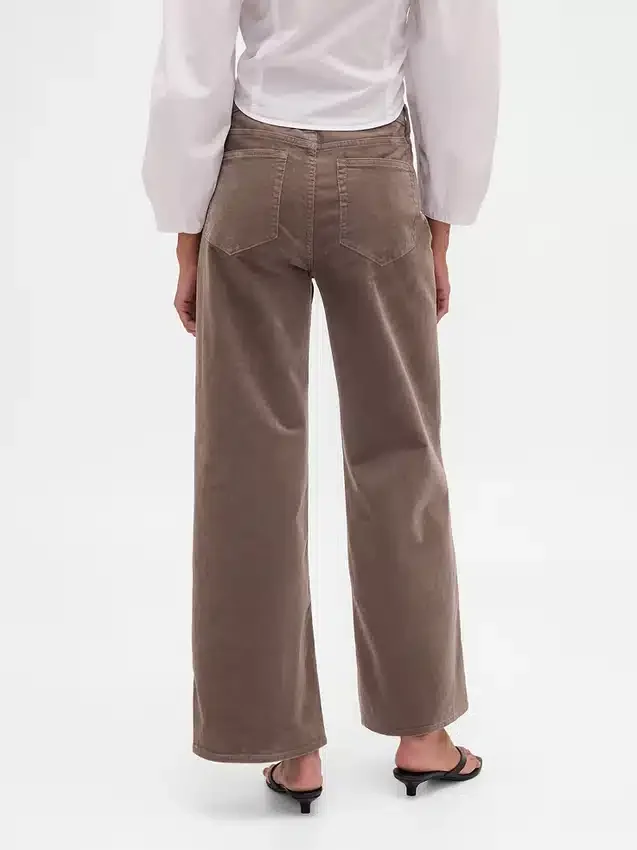 Pantaloni a gamba larga in velluto a coste a vita alta