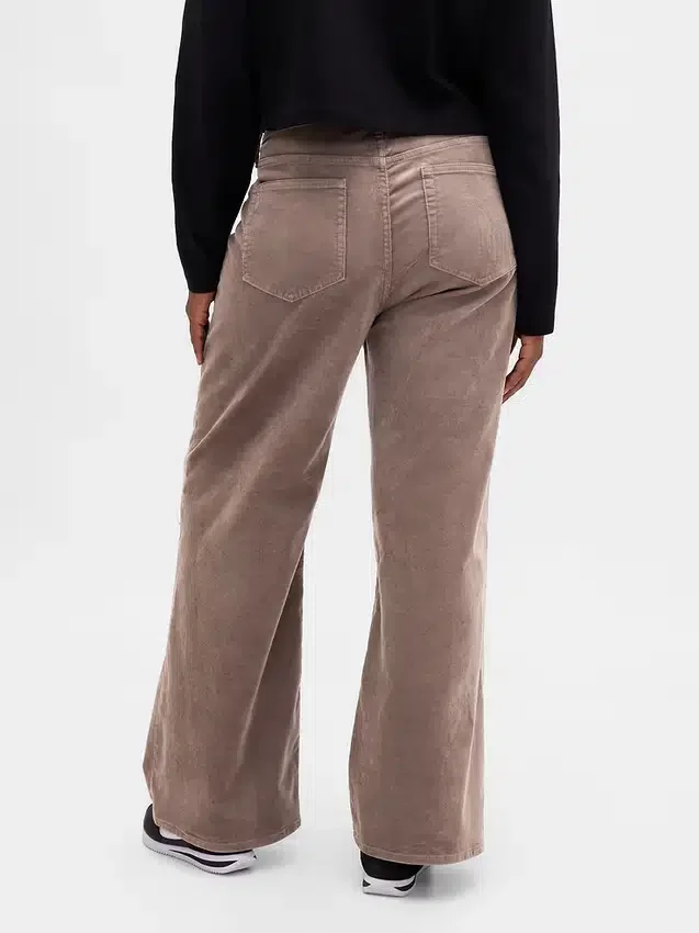 Pantaloni a gamba larga in velluto a coste a vita alta