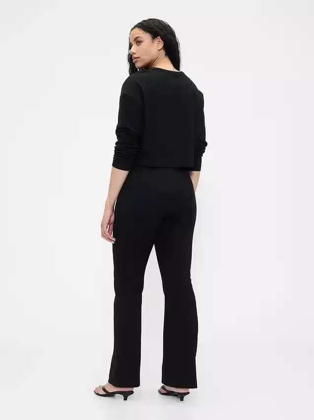Pantaloni a stivale a vita alta in maglia doppia
