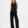Pantaloni a vita bassa con pieghe e gamba larga 365