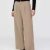 Pantaloni a vita bassa con pieghe e gamba larga 365