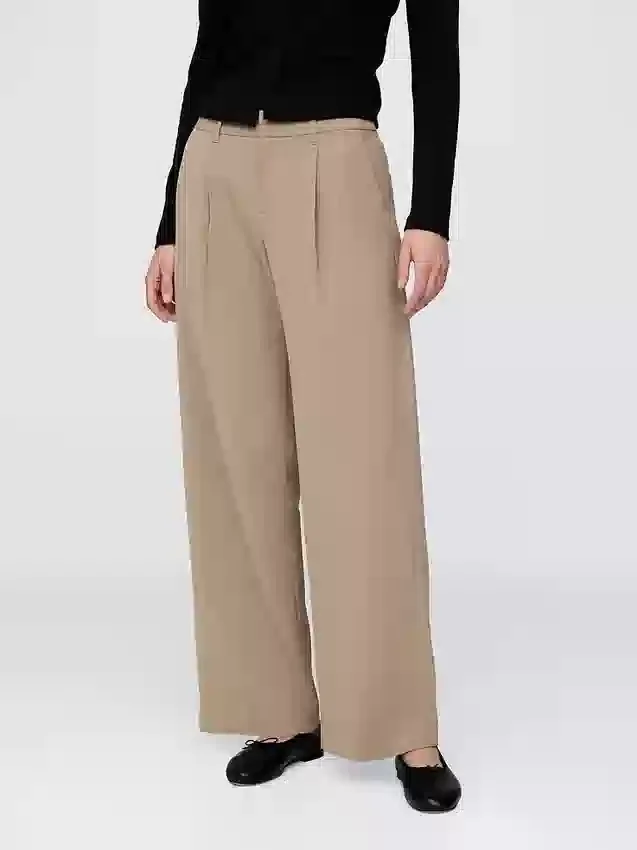 Pantaloni a vita bassa con pieghe e gamba larga 365