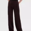 Pantaloni a vita bassa con pieghe e gamba larga 365