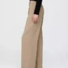 Pantaloni a vita bassa con pieghe e gamba larga 365