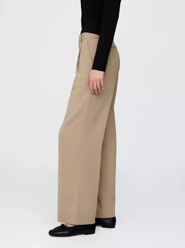 Pantaloni a vita bassa con pieghe e gamba larga 365