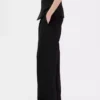 Pantaloni a vita bassa con pieghe e gamba larga 365