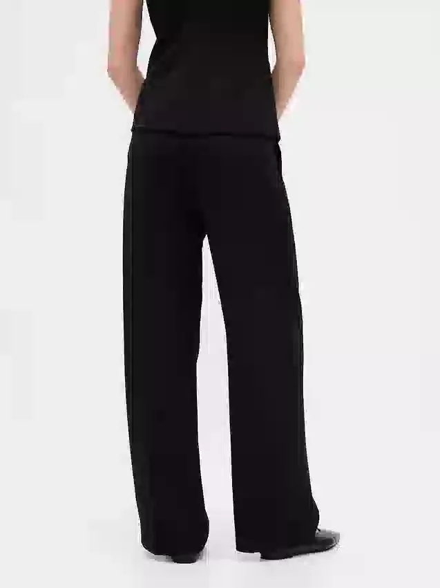 Pantaloni a vita bassa con pieghe e gamba larga 365