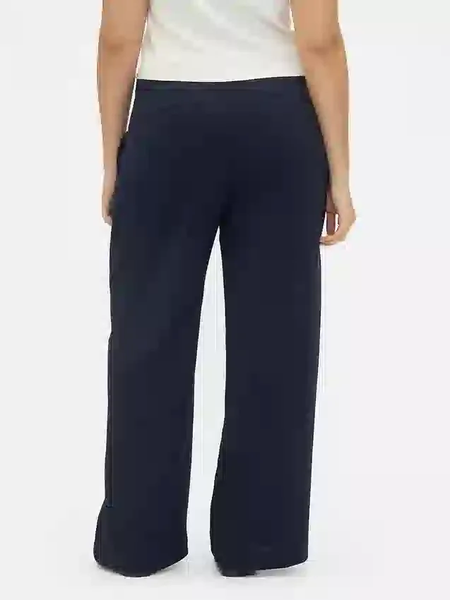 Pantaloni a vita bassa con pieghe e gamba larga 365