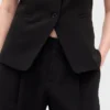 Pantaloni a vita bassa con pieghe e gamba larga 365