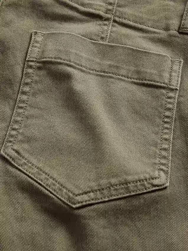 Pantaloni a vita bassa in twill dal taglio lungo e slanciato