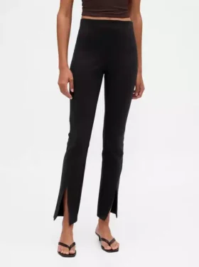 Pantaloni a zampa con orlo a spacco in maglia doppia a vita alta