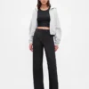 Pantaloni a zampa GapFit Tech a vita alta