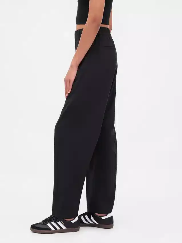 Pantaloni a zampa GapFit Tech a vita alta