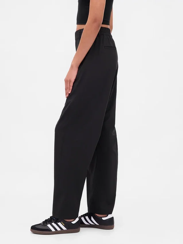 Pantaloni a zampa GapFit Tech a vita alta