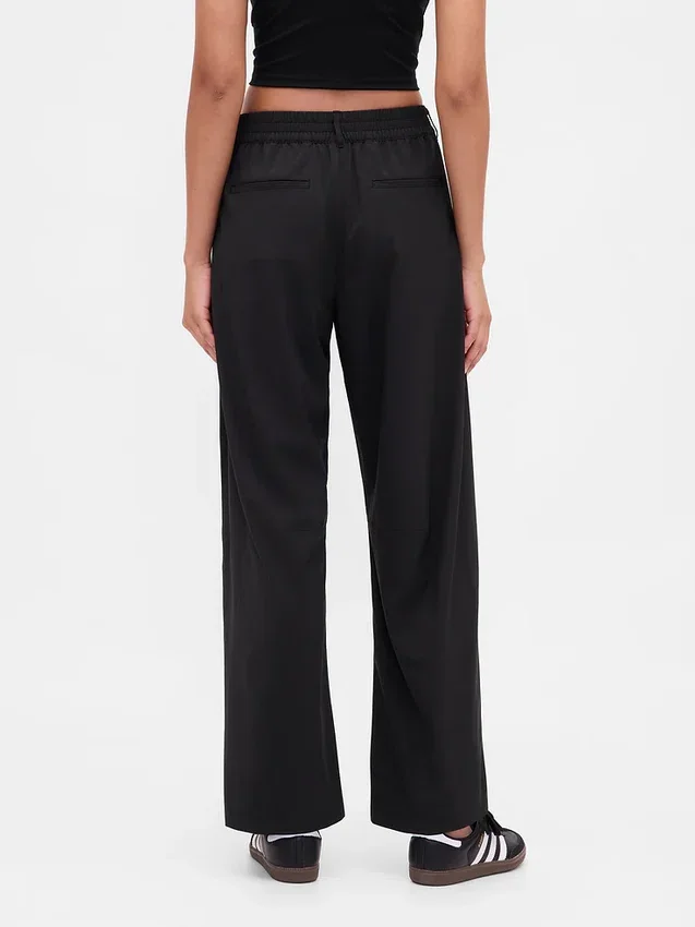 Pantaloni a zampa GapFit Tech a vita alta
