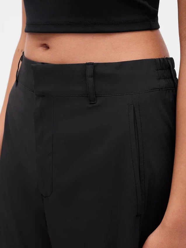 Pantaloni a zampa GapFit Tech a vita alta